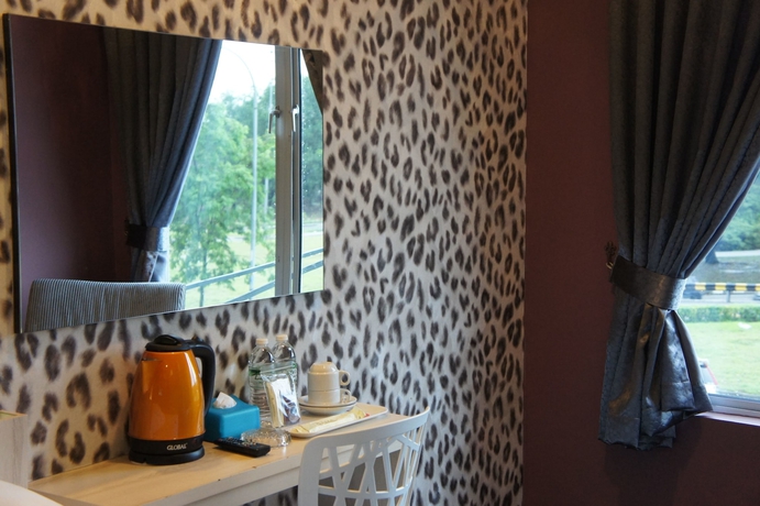 Imagen de la habitación del Hotel V3 Taman Gaya. Foto 7