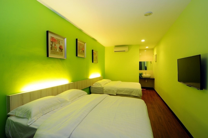 Imagen de la habitación del Hotel V3 Taman Gaya. Foto 9