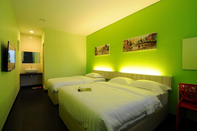 Imagen de la habitación del Hotel V3 Taman Gaya. Foto 10