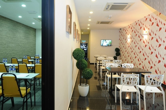 Imagen del bar/restaurante del Hotel V3 Taman Gaya. Foto 3