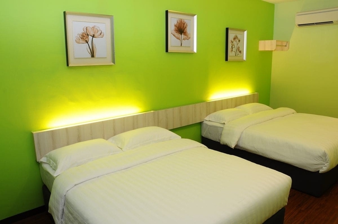 Imagen de la habitación del Hotel V3 Taman Gaya. Foto 12