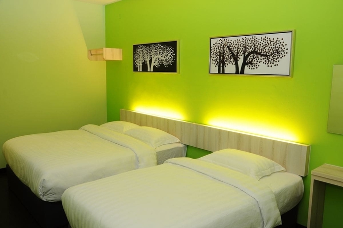 Imagen de la habitación del Hotel V3 Taman Gaya. Foto 13