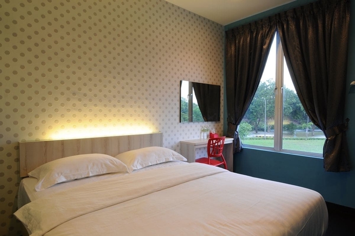Imagen de la habitación del Hotel V3 Taman Gaya. Foto 15
