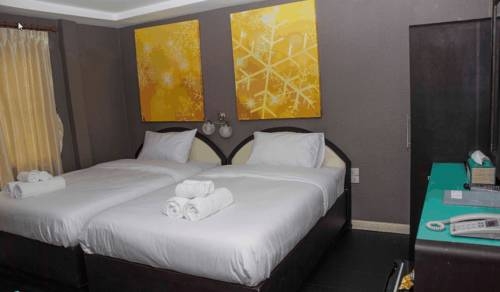 Imagen de la habitación del Hotel V30 Sukhumvit. Foto 5