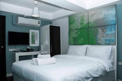 Imagen de la habitación del Hotel V30 Sukhumvit. Foto 16