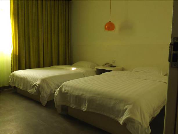 Imagen de la habitación del Hotel V8 Xi Lang Branch. Foto 5
