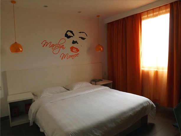 Imagen de la habitación del Hotel V8 Xi Lang Branch. Foto 10