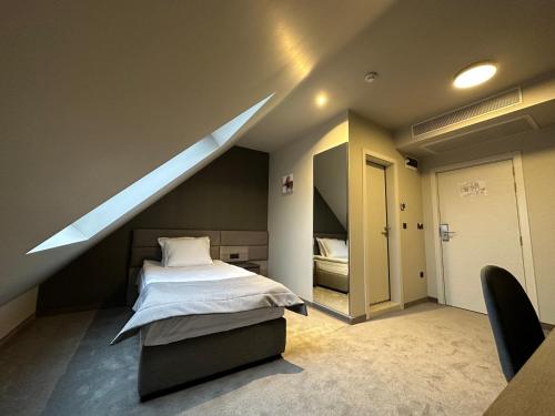 Imagen de la habitación del Hotel VALOR. Foto 17
