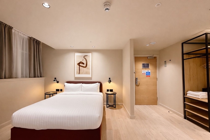 Imagen de la habitación del Hotel VCity Suites at Teachers. Foto 14