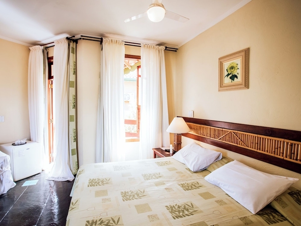 Imagen de la habitación del Hotel VELINN Pousada Ponta do Pequeah. Foto 11