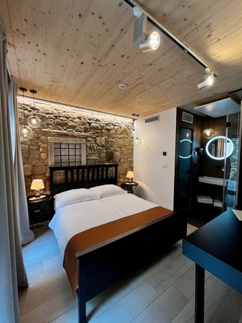 Imagen de la habitación del Hotel VENEZIANA Boutique Superior. Foto 7
