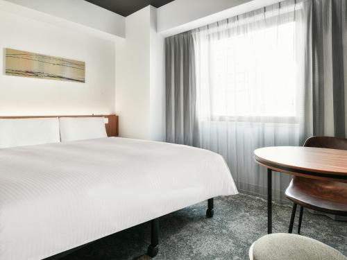 Imagen de la habitación del Hotel VESSEL INN NAMBA. Foto 18