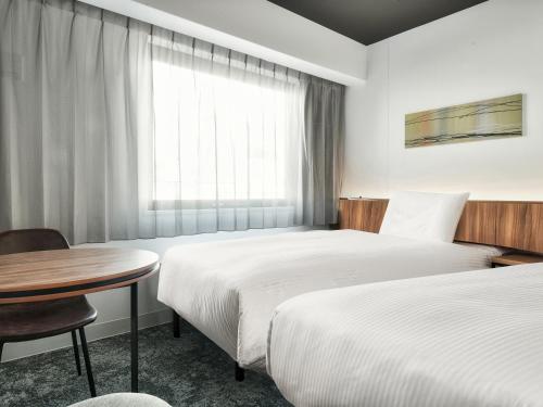 Imagen de la habitación del Hotel VESSEL INN NAMBA. Foto 20