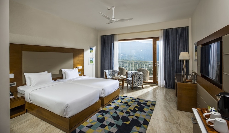 Imagen de la habitación del Hotel VIBE MUNNAR. Foto 2