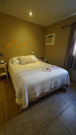 Imagen de la habitación del Hotel VILLA BRASIL MOTEL. Foto 3