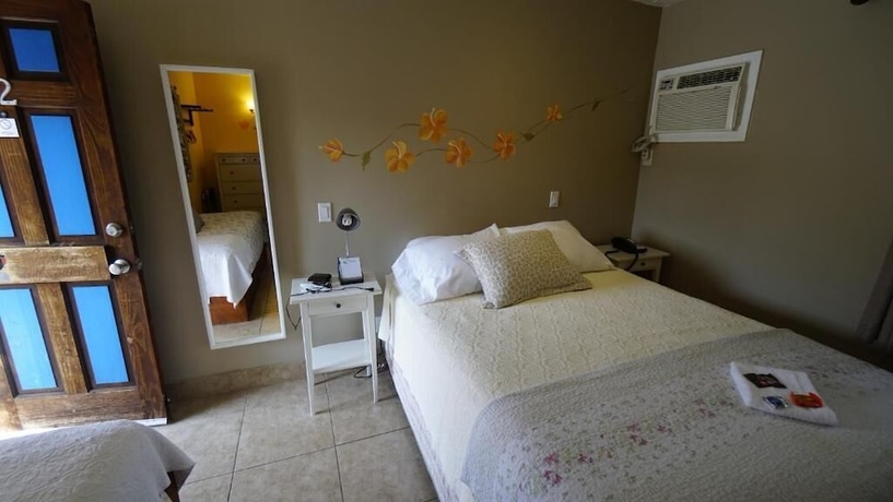 Imagen de la habitación del Hotel VILLA BRASIL MOTEL. Foto 7