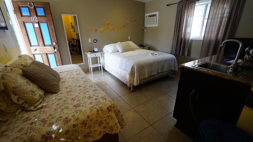 Imagen de la habitación del Hotel VILLA BRASIL MOTEL. Foto 14