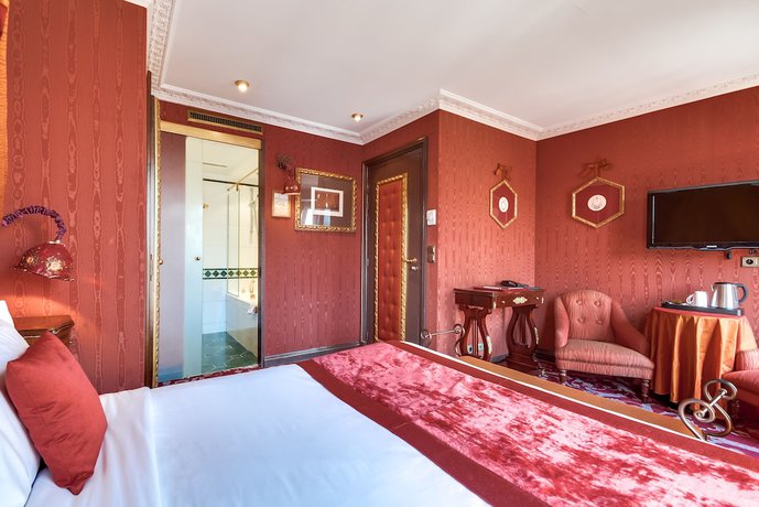 Imagen de la habitación del Hotel VILLA ROYALE, París. Foto 12