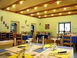 Imagen del bar/restaurante del Hotel VILLAGE GREEN ROOM CHALET. Foto 10