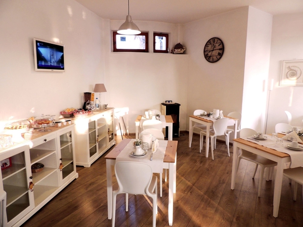 Imagen del bar/restaurante del Hotel VILLAGGIO LE MIMOSE. Foto 4