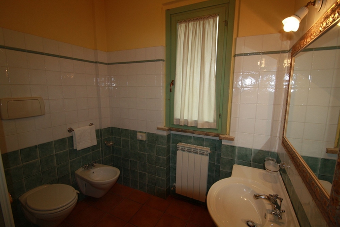 Imagen de la habitación del Hotel VILLAGGIO LE MIMOSE. Foto 9
