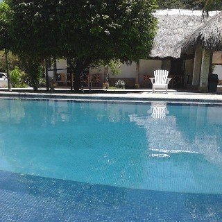 Imagen de la piscina del Hotel VILLAS KIN-HA. Foto 13