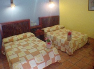 Imagen de la habitación del Hotel VILLAS KIN-HA. Foto 9