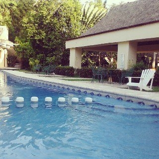 Imagen de la piscina del Hotel VILLAS KIN-HA. Foto 14