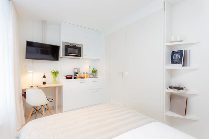 Imagen de la habitación del Hotel VISIONAPARTMENTS Zug Baarerstrasse. Foto 14