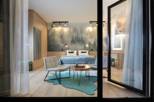 Imagen de la habitación del Hotel VISLOW Resort. Foto 7