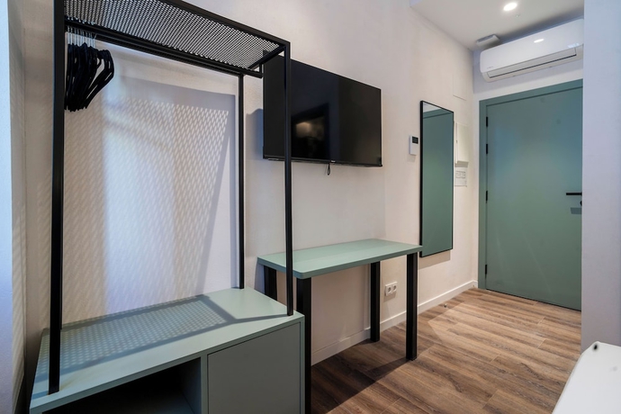 Imagen de la habitación del Hotel VLC Host - Reina. Foto 5
