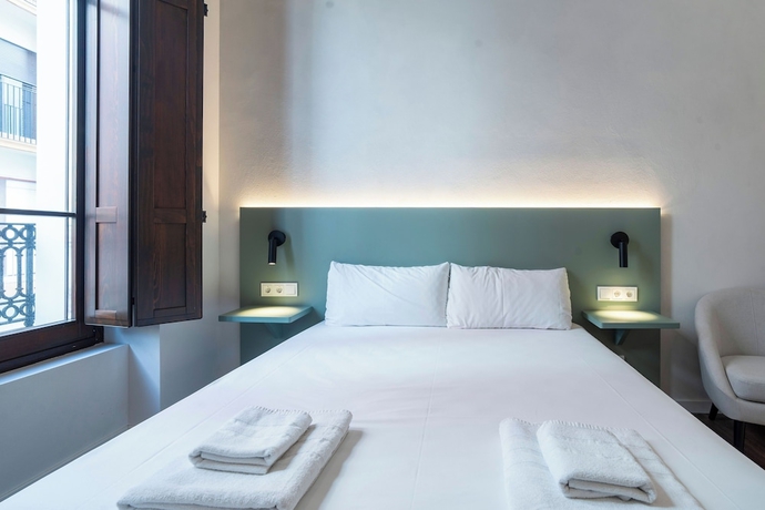 Imagen de la habitación del Hotel VLC Host - Reina. Foto 6