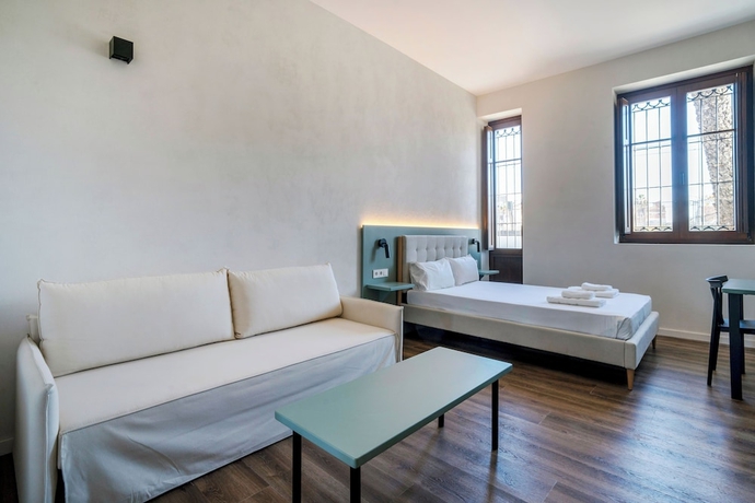 Imagen de la habitación del Hotel VLC Host - Reina. Foto 9