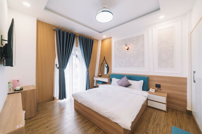 Imagen de la habitación del Hotel VMT Villa. Foto 11