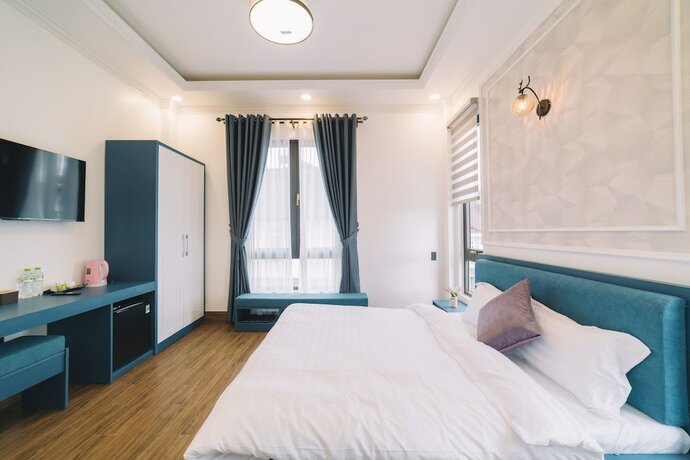 Imagen de la habitación del Hotel VMT Villa. Foto 14