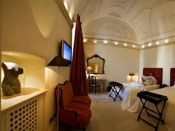 Imagen de la habitación del Hotel VRetreats Palazzo Gattini. Foto 1