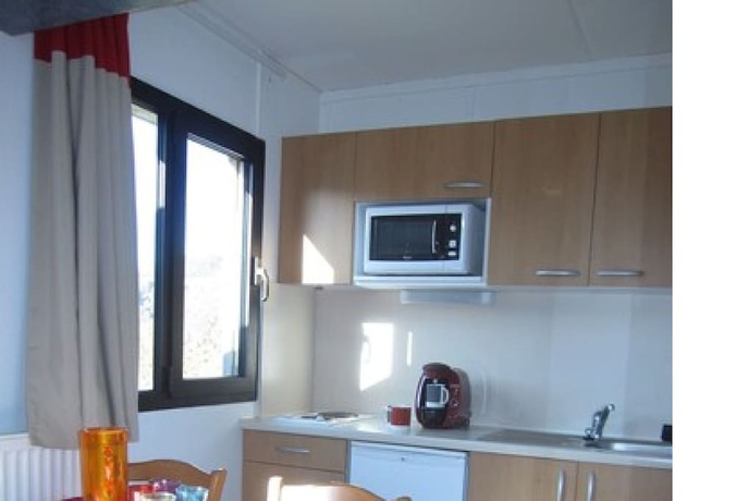 Imagen de la habitación del Hotel VVF Le Lioran Les Monts du Cantal, Saint Jacques des Blats. Foto 16