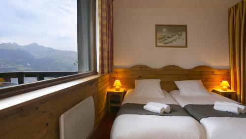 Imagen de la habitación del Hotel VVF Les Sitelles à Montalbert la Plagne. Foto 20