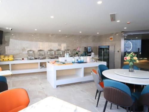 Imagen general del Hotel VX Jiangsu Taizhou Xinghua RT-Mart. Foto 2