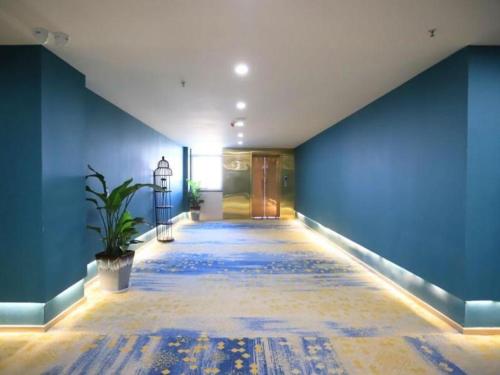 Imagen general del Hotel VX Jiangsu Taizhou Xinghua RT-Mart. Foto 5