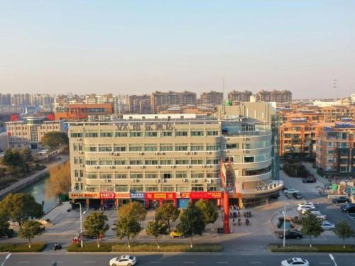Imagen general del Hotel VX Jiangsu Taizhou Xinghua RT-Mart. Foto 11