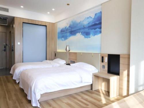 Imagen general del Hotel VX Jiangsu Taizhou Xinghua RT-Mart. Foto 12