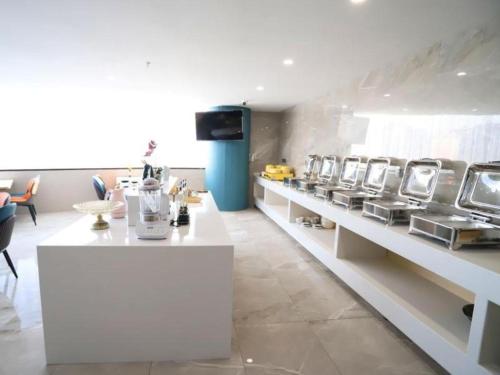 Imagen general del Hotel VX Jiangsu Taizhou Xinghua RT-Mart. Foto 16