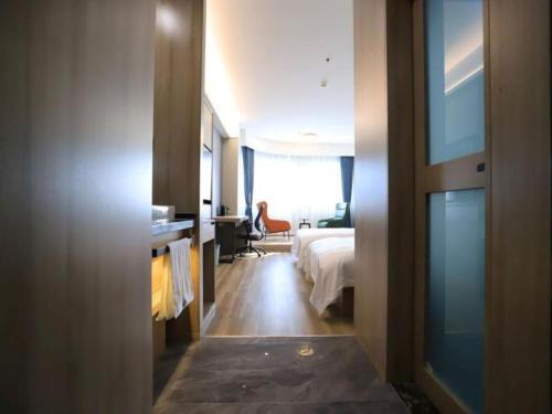 Imagen general del Hotel VX Jiangsu Taizhou Xinghua RT-Mart. Foto 17