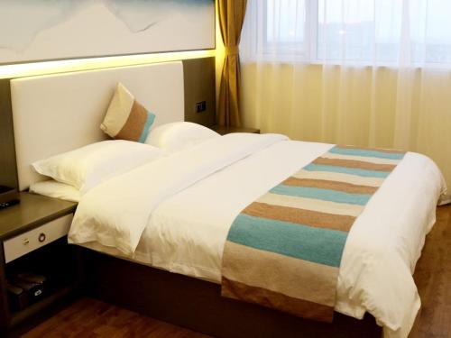 Imagen de la habitación del Hotel VX Lianyungang Guanyun Baichen Plaza. Foto 14