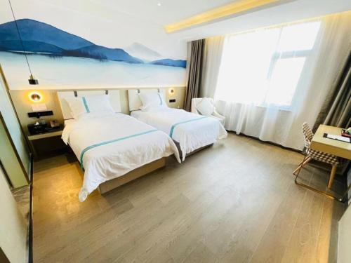 Imagen de la habitación del Hotel VX Xiao County Railway Station Century Avenue zheshang Market. Foto 17