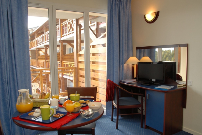 Imagen de los interiores del Hotel Vacancéole - Appart Vacances Pyrénées 2000. Foto 9