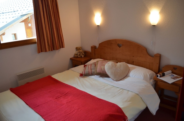 Imagen de la habitación del Hotel Vacancéole - Les Chalets de la Ramoure. Foto 10