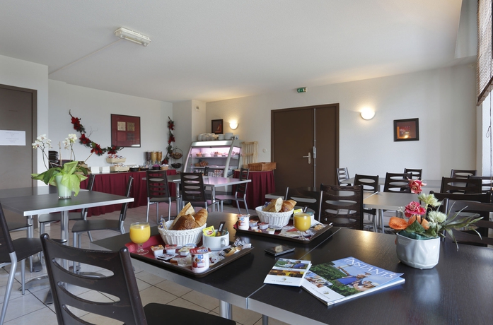 Imagen del bar/restaurante del Hotel Vacanc&eacute;ole - Les Demeures Champenoises Confort. Foto 1