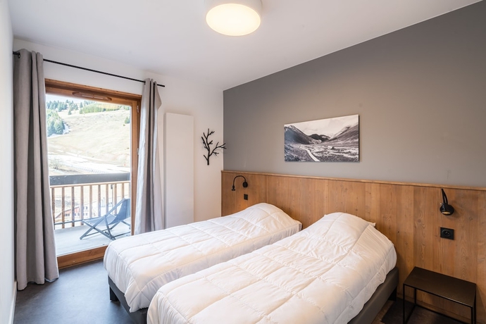 Imagen de la habitación del Hotel Vacanc&eacute;ole - Les Ecrins d\'Auris. Foto 6